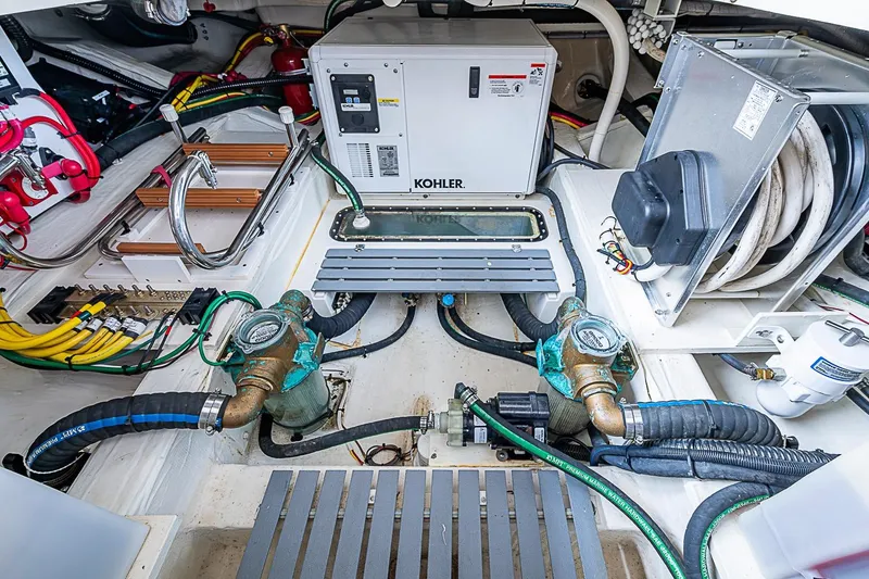 Slide: The Image of Engine room of 2023 Hinckley Sport Boat 40 X with Kohler generator and wiring. - 28