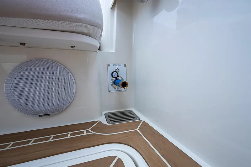Slide: The Image of Hinckley Sport Boat 40 X 2023 interior detail with speaker and control panel. - 10