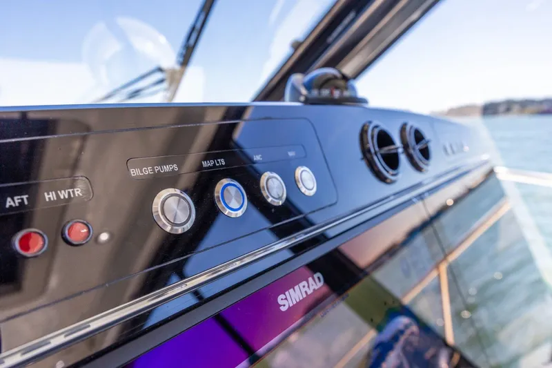 Slide: The Image of Control panel of 2023 Boston Whaler 405 Conquest boat with Simrad electronics. - 28