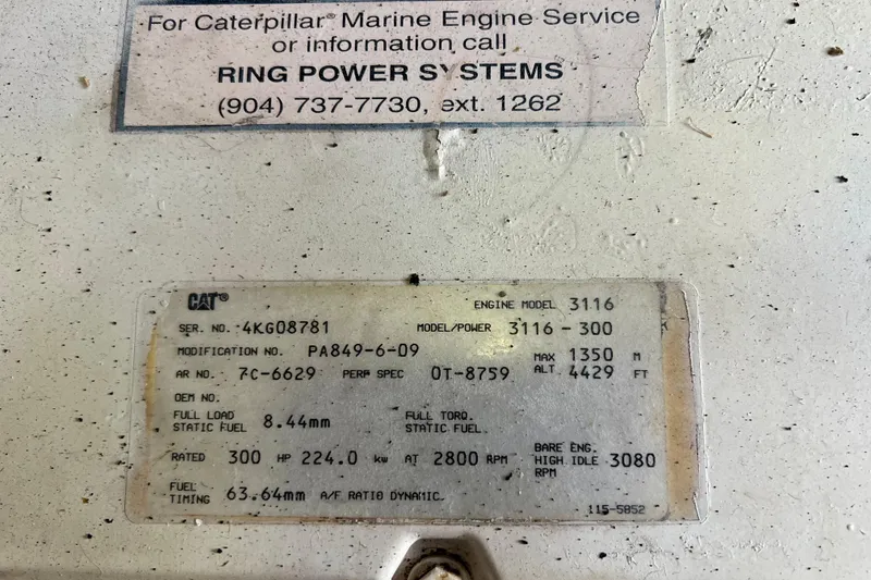 Slide: The Image of Caterpillar engine specifications for Mainship 350 Trawler, 1999 model. - 43
