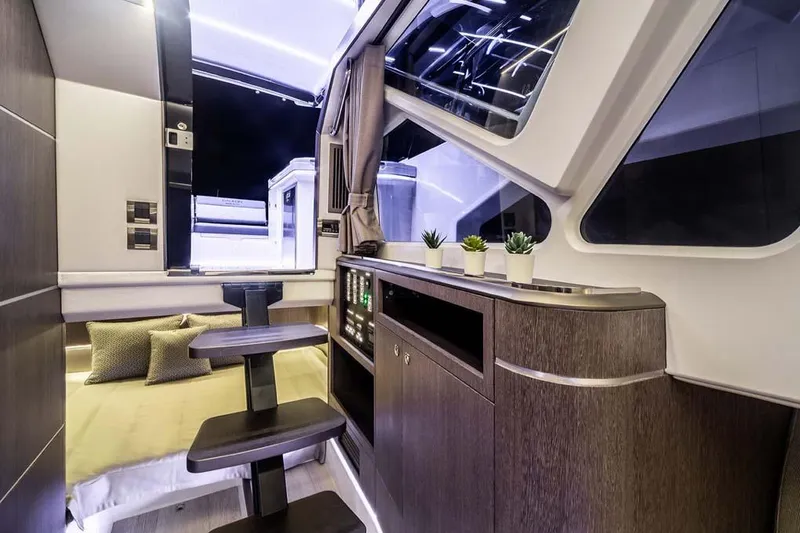 Slide: The Image of Manufacturer Provided Image: Luxurious interior of 2025 Galeon 335 GTO yacht with modern design and cozy sleeping area. - 5