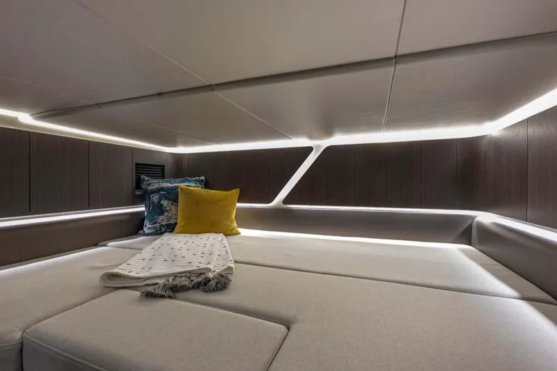 Slide: The Image of Manufacturer Provided Image: Luxurious interior cabin of 2025 Galeon 335 GTO yacht with modern lighting and cozy bedding. - 6