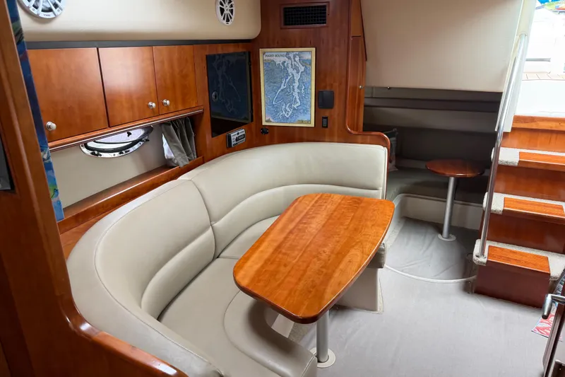 Slide: The Image of Luxurious interior of 2007 Cruisers 340 Express yacht with elegant seating and wooden finishes. - 22