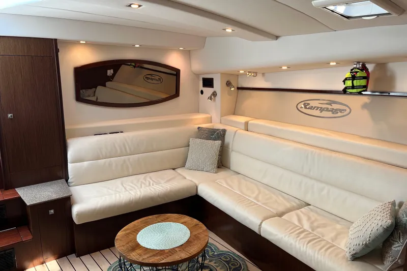 Slide: The Image of Luxurious interior of 2011 Rampage 41 Express yacht with plush seating and elegant decor. - 15