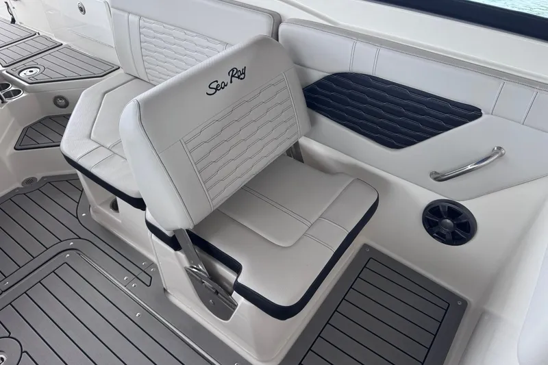 Slide: The Image of 2021 Sea Ray SPX 230 boat interior with stylish seating and modern design. - 15