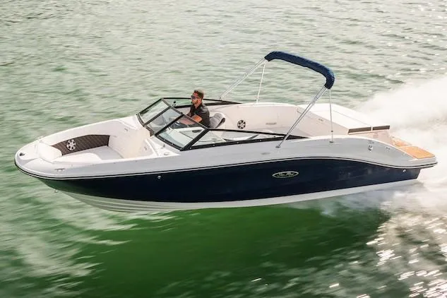 Slide: The Image of Manufacturer Provided Image: 2021 Sea Ray SPX 230 boat cruising on water. - 29