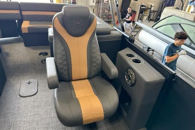 Slide: The Image of Luxurious seating on 2026 Godfrey Monaco 23' Ultra Lounge Tritoon, featuring premium upholstery and cup holders. - 12