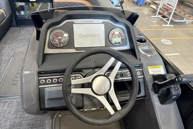 Slide: The Image of Steering console of 2026 Godfrey Monaco 23' Ultra Lounge Tritoon with Garmin display. - 11
