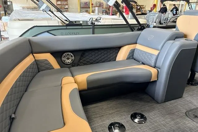 Slide: The Image of Luxurious seating on 2026 Godfrey Monaco 23' Ultra Lounge Tritoon, featuring elegant upholstery and design. - 13