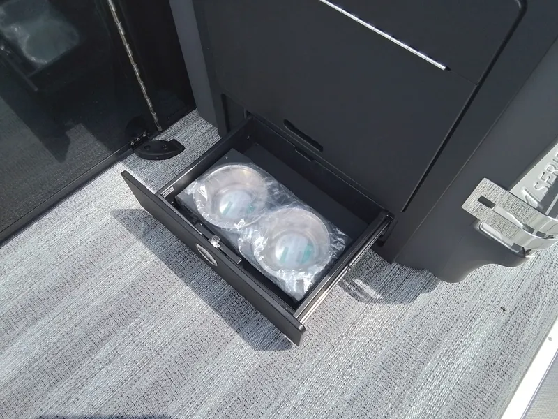 Slide: The Image of A drawer on a boat containing two packaged plates. - 18