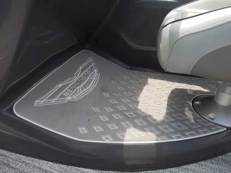 Slide: The Image of Close-up of a Bennington boat floor with textured design and a seat. - 27