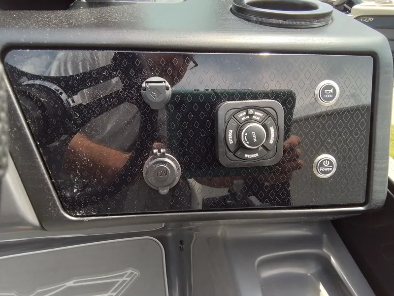 Slide: The Image of Close-up of a boat control panel with buttons and sockets. - 31