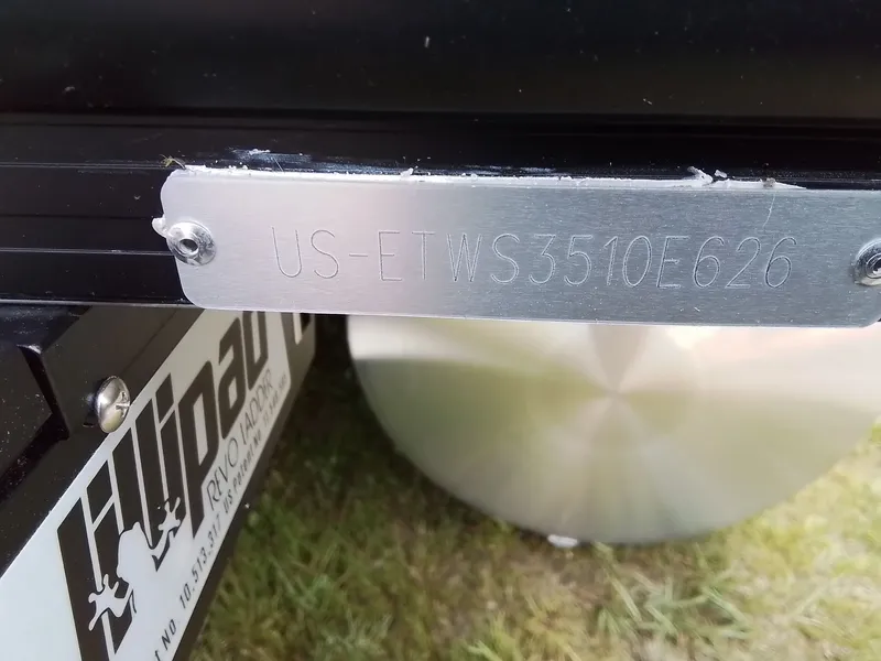Slide: The Image of Close-up of a boat serial number plate reading "US-ETWS3510E626." - 33