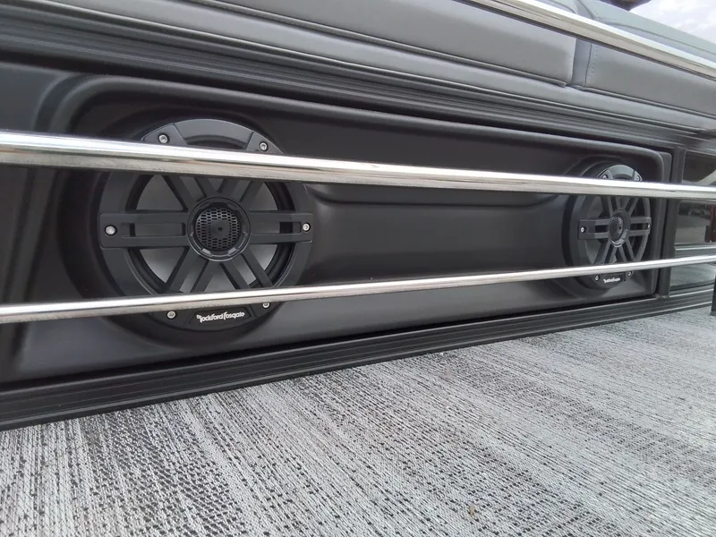 Slide: The Image of Close-up of speakers on the side of a Bennington 23M1SB boat. - 8