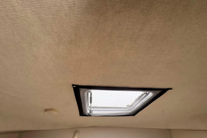 Slide: The Image of Ceiling hatch of 2001 Bayliner 3258 Command Bridge boat interior. - 22