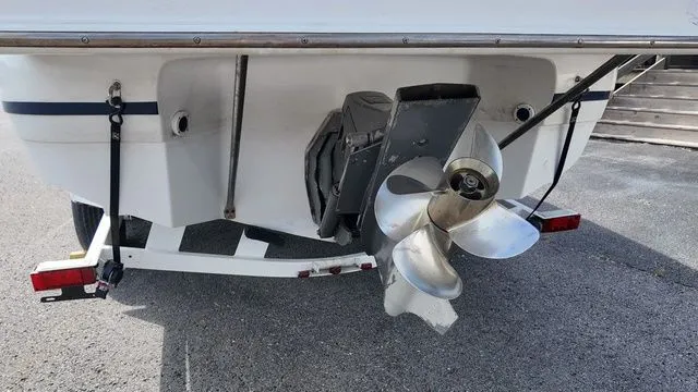 Slide: The Image of Rear view of a 2005 Regal 2400 LSR boat with a large propeller. - 4