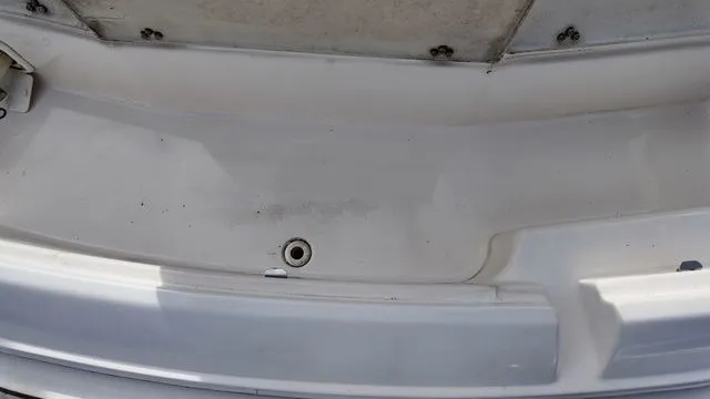 Slide: The Image of Close-up of the cockpit area of a 2005 Regal 2400 LSR boat. - 11