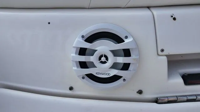 Slide: The Image of Close-up of a speaker on a 2005 Regal 2400 LSR boat. - 12
