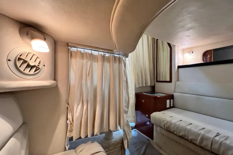 Slide: The Image of Interior of 2002 Sea Ray 340 Sundancer yacht, featuring cozy seating and elegant design. - 45