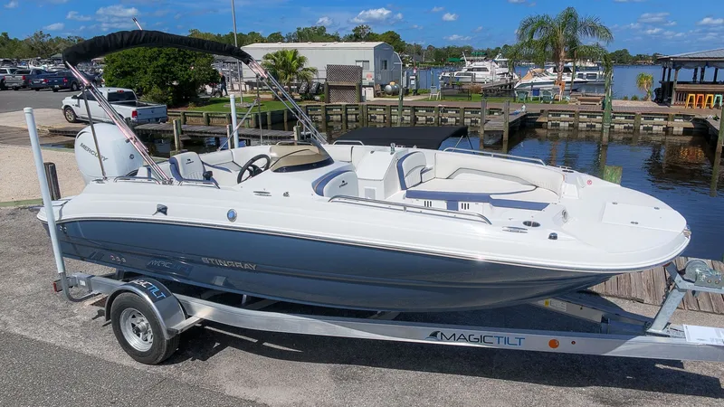 Slide: The Image of A modern 2027 Stingray 192 SC on a trailer, ready for use by the water. - 4