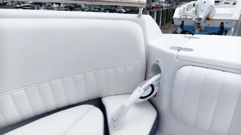 Slide: The Image of Close-up of a white boat seat with an integrated speaker and water droplets. - 23