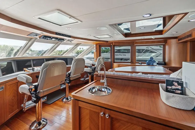 Slide: The Image of Luxurious interior of 2012 Ocean Alexander 90 Skylounge Motoryacht with helm and seating area. - 37