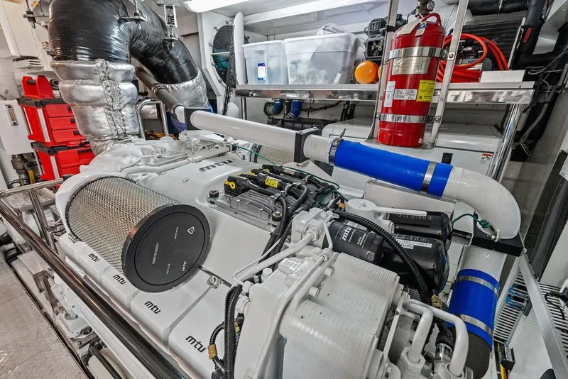 Slide: The Image of Engine room of 2012 Ocean Alexander 90 Skylounge Motoryacht with MTU engine and fire extinguisher. - 107