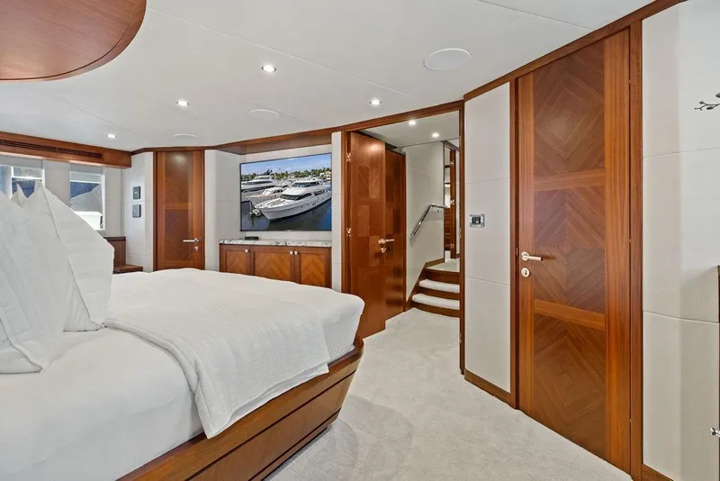 Slide: The Image of Luxurious bedroom interior of 2012 Ocean Alexander 90 Skylounge Motoryacht with elegant wood finishes. - 75