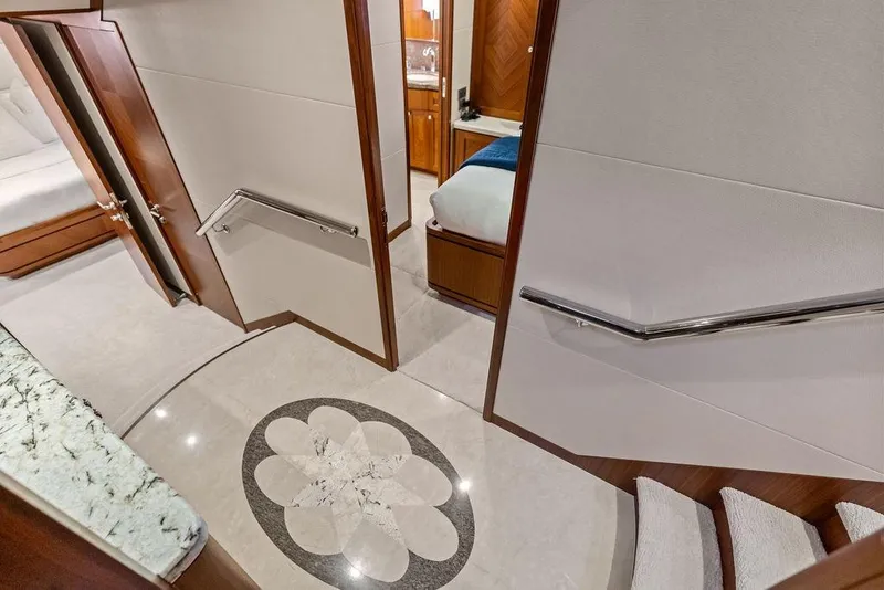 Slide: The Image of Luxurious interior of 2012 Ocean Alexander 90 Skylounge Motoryacht with elegant wood finishes. - 69