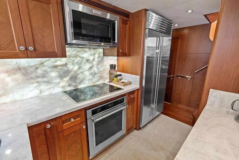 Slide: The Image of Luxurious kitchen in 2012 Ocean Alexander 90 Skylounge Motoryacht with modern appliances. - 47