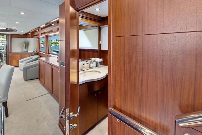 Slide: The Image of Luxurious interior of 2012 Ocean Alexander 90 Skylounge Motoryacht with elegant wood finishes. - 54