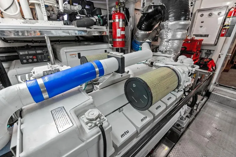 Slide: The Image of Engine room of 2012 Ocean Alexander 90 Skylounge Motoryacht, featuring MTU engines and equipment. - 108