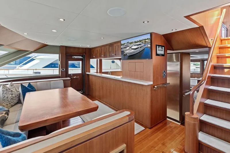 Slide: The Image of Luxurious interior of 2012 Ocean Alexander 90 Skylounge Motoryacht with elegant wood finishes. - 43