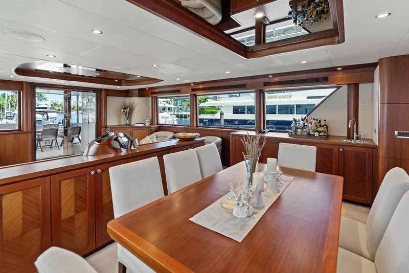 Slide: The Image of Luxurious interior of 2012 Ocean Alexander 90 Skylounge Motoryacht with elegant dining area. - 58