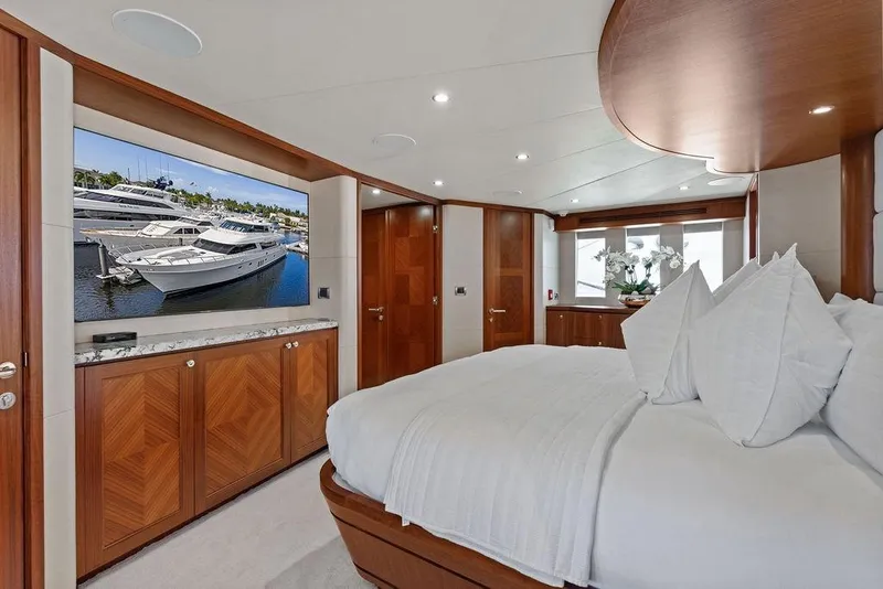 Slide: The Image of Luxurious bedroom interior of 2012 Ocean Alexander 90 Skylounge Motoryacht with elegant wood finishes. - 73