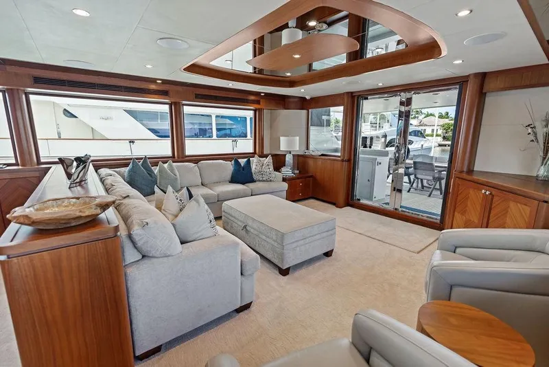 Slide: The Image of Luxurious interior of 2012 Ocean Alexander 90 Skylounge Motoryacht with elegant seating and wood accents. - 62