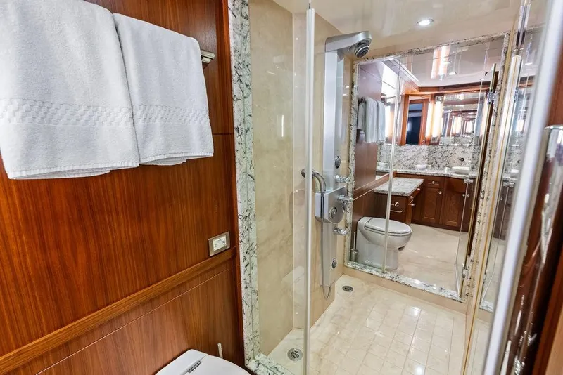 Slide: The Image of Luxurious bathroom in 2012 Ocean Alexander 90 Skylounge Motoryacht with marble and wood finishes. - 78