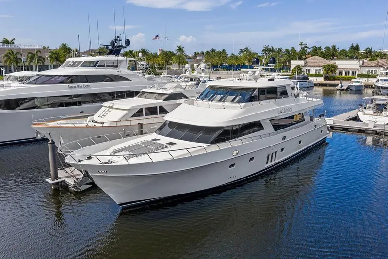 Slide: The Image of 2012 Ocean Alexander 90 Skylounge Motoryacht docked in a marina. - 4