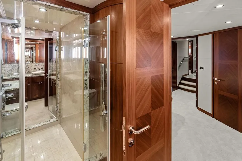 Slide: The Image of Luxurious bathroom interior of 2012 Ocean Alexander 90 Skylounge Motoryacht with elegant wood finishes. - 81