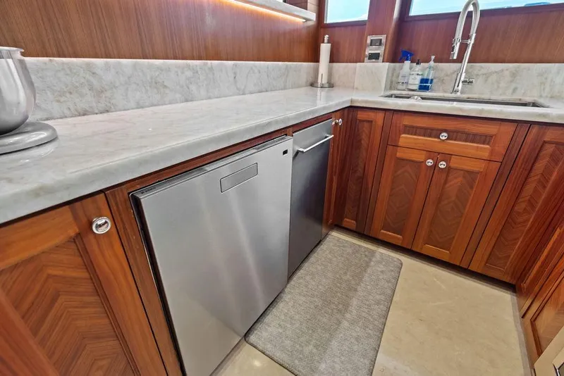 Slide: The Image of Luxurious kitchen interior of 2012 Ocean Alexander 90 Skylounge Motoryacht with marble countertops. - 49