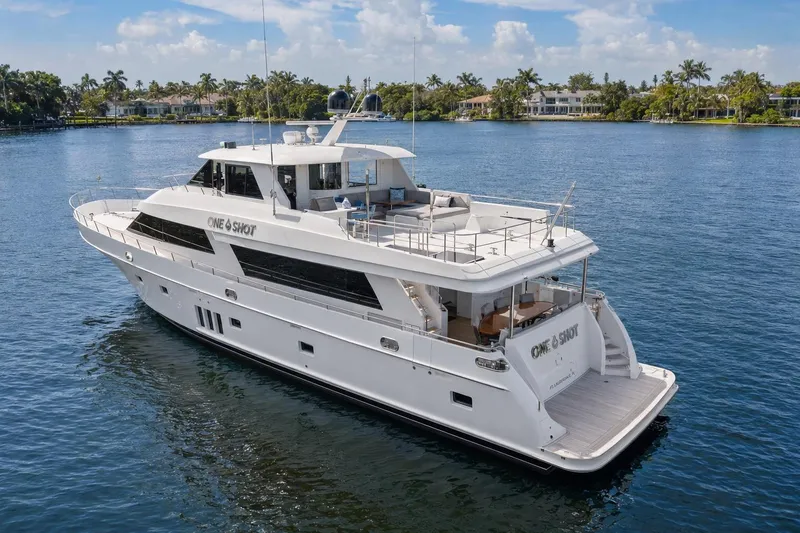 Slide: The Image of Luxurious 2012 Ocean Alexander 90 Skylounge Motoryacht cruising on serene waters. - 2