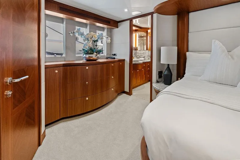Slide: The Image of Luxurious bedroom interior of 2012 Ocean Alexander 90 Skylounge Motoryacht with elegant wood finishes. - 74