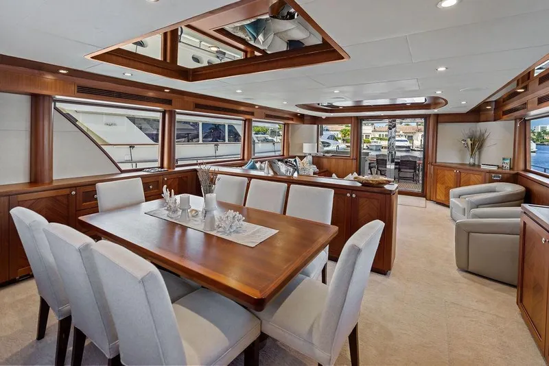 Slide: The Image of Luxurious interior of 2012 Ocean Alexander 90 Skylounge Motoryacht with elegant dining area. - 61