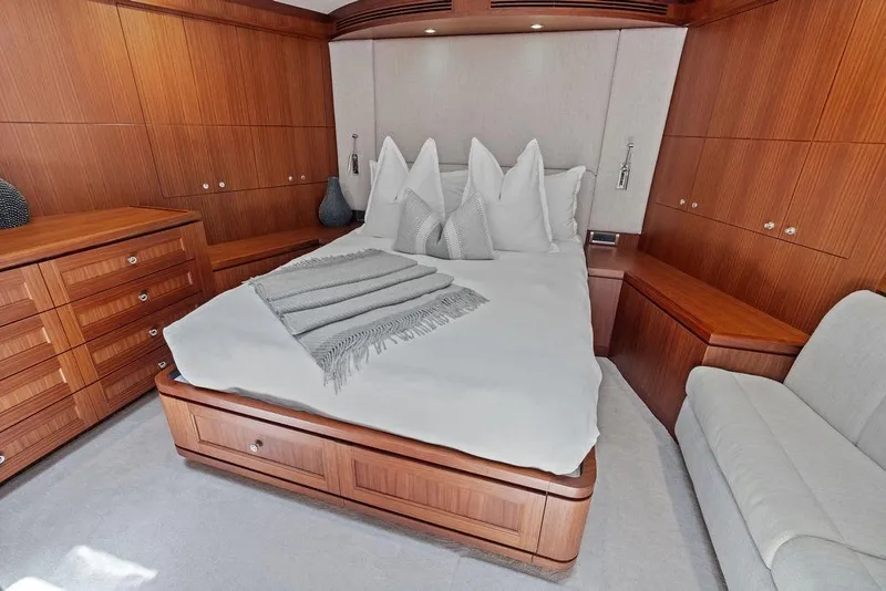 Slide: The Image of Luxurious bedroom interior of 2012 Ocean Alexander 90 Skylounge Motoryacht with elegant wood finish. - 87
