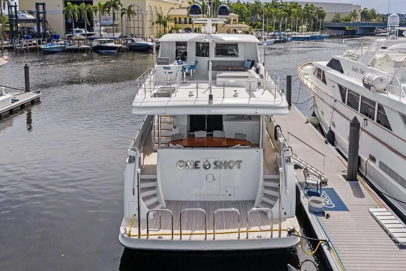 Slide: The Image of Ocean Alexander 90 Skylounge Motoryacht, 2012, docked at marina with elegant design. - 9