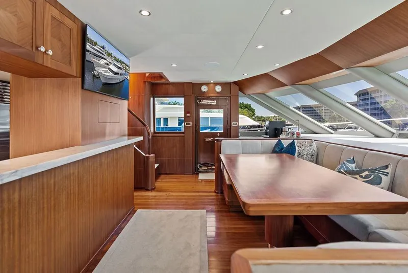 Slide: The Image of Luxurious interior of 2012 Ocean Alexander 90 Skylounge Motoryacht with elegant wood finishes. - 53