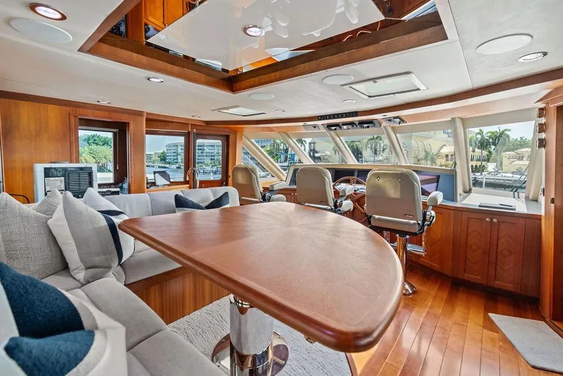 Slide: The Image of Luxurious interior of 2012 Ocean Alexander 90 Skylounge Motoryacht with plush seating and helm. - 38