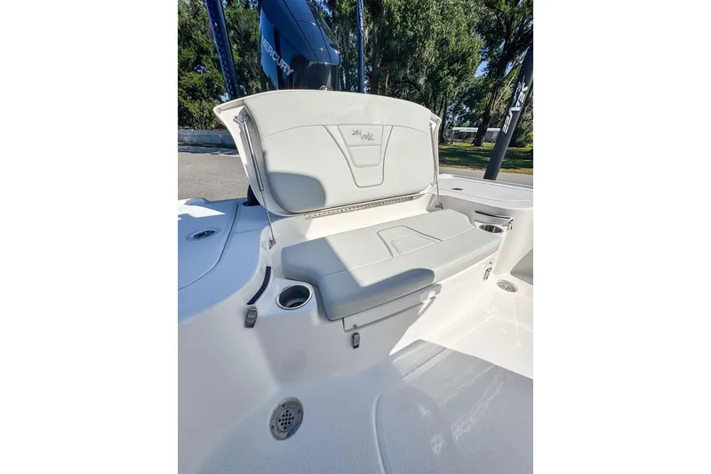 Slide: The Image of 2026 SeaVee 270Z boat interior with open storage compartment and seating. - 13