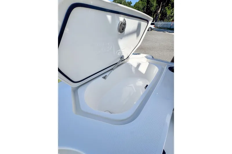 Slide: The Image of Open storage compartment on 2026 SeaVee 270Z boat, showcasing interior design and functionality. - 14