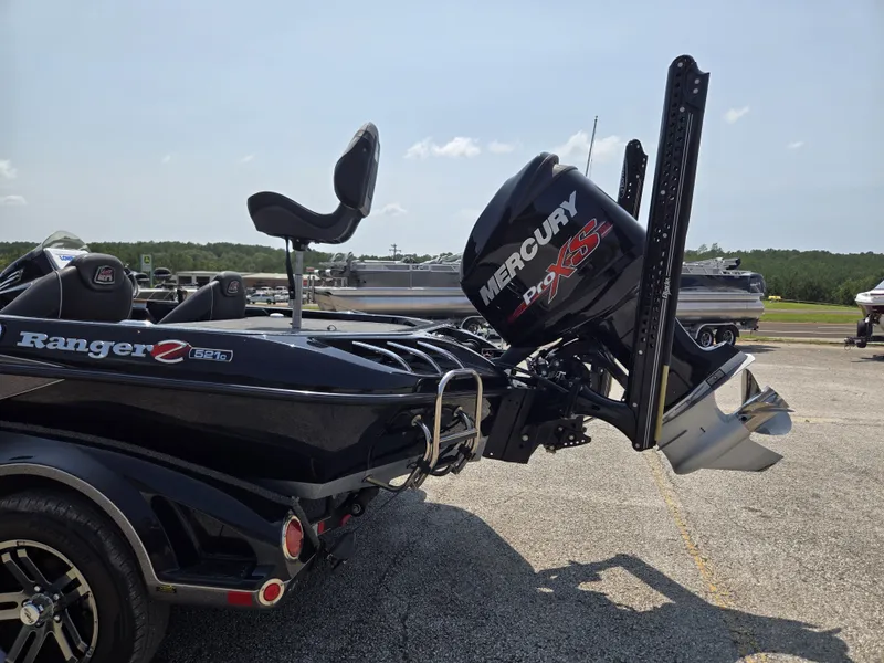 Slide: The Image of A Ranger Z521 Comanche boat with a Mercury Pro XS outboard motor on a trailer. - 5
